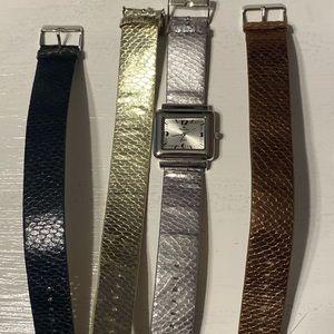 Watch with 4 interchangeable bands. New.